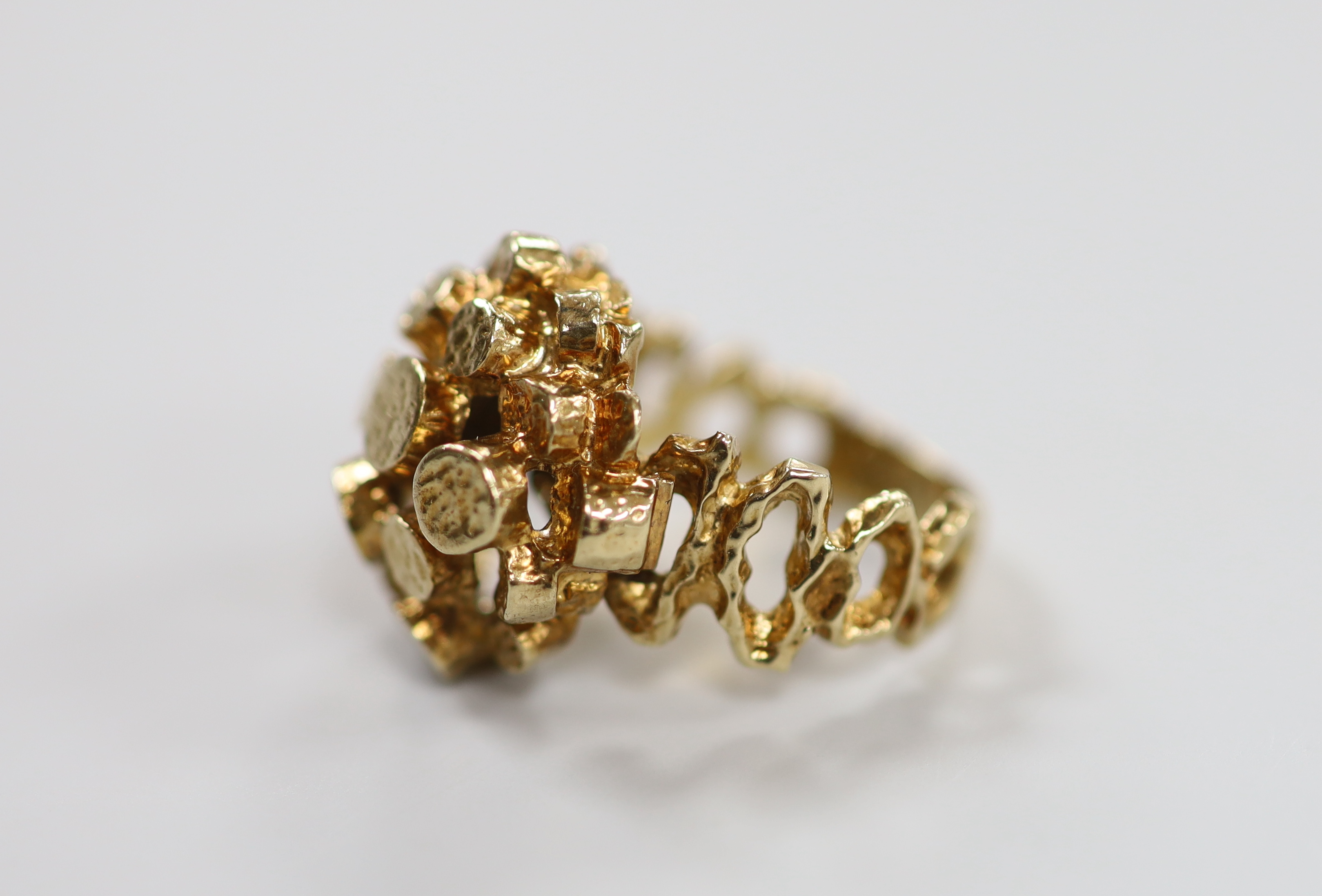 A 1960's/1970's 9ct gold modernist ring, size N, 9.1 grams.